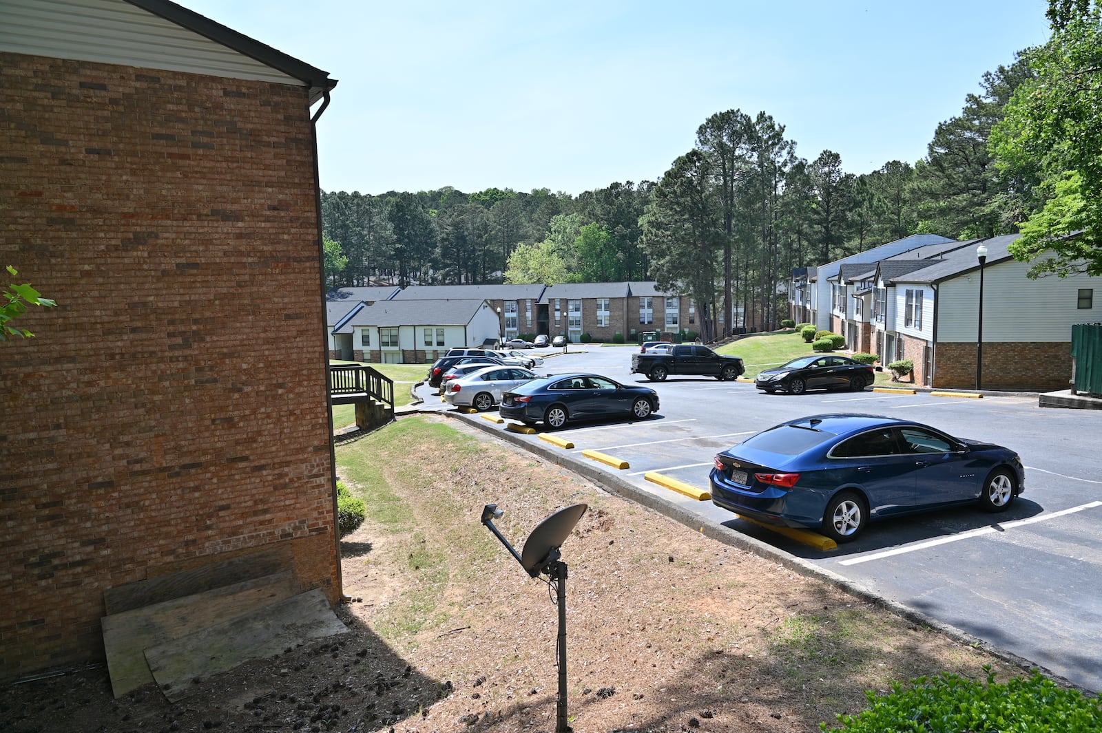 The Life at Greenbriar, now renamed The Hills @ Greenbriar, is a ragged collection of 376 apartments on a violence-plagued stretch of Campbellton Road in southwest Atlanta. One resident, whose car was riddled with bullets, then towed with no warning, says, “It’s a lot, staying here. They don’t have no control over this neighborhood.” (Hyosub Shin / Hyosub.Shin@ajc.com)