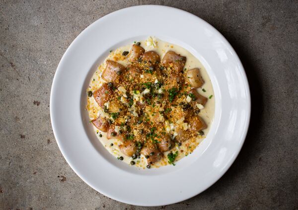 Light, delicate gnocchi in a lemony caper cream sauce is one of the carryovers from Adele's original location in Nashville. Ryan Fleisher for The Atlanta Journal-Constutition