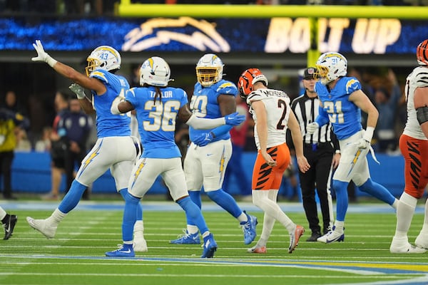 Cincinnati Bengals place kicker Evan McPherson (2) lowers his head after missing on a field goal attempt during the second half of an NFL football game against the Los Angeles Chargers, Sunday, Nov. 17, 2024, in Inglewood, Calif. (AP Photo/Gregory Bull)