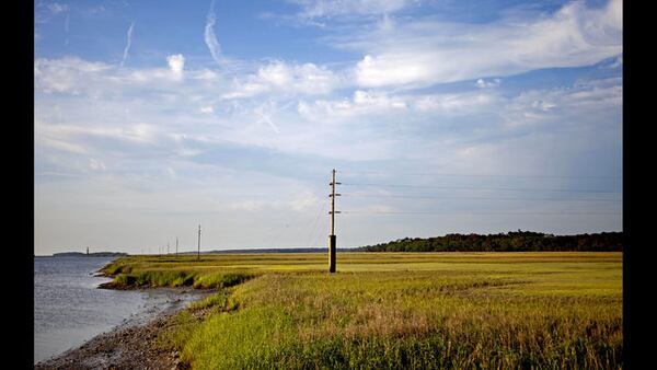 <p>               FILE - In this May 16, 2013, file photo, a utility pole stands in the middle of a marsh at sunset on Sapelo Island, Ga., a Gullah-Geechee community. A tight-knit community of slave descendants on the South Carolina coast is used to riding out big storms, from a storm that killed an estimated 2,000 people in 1893 to Tropical Storm Irma last year. (AP Photo/David Goldman, File)             </p> <p>               In this Sept. 11, 2018 photo, John Brown stands behind a fence for his cows outside his home on St. Helena Island, S.C. Brown and other residents of the island's Gullah community of slave descendants are watching Hurricane Florence as it approaches the Carolinas. St. Helena's Gullah residents have a long history of riding out storms, including a hurricane that killed an estimated 2,000 people in 1893. (AP Photo/Russ Bynum)             </p> <p>               FILE - In this June 10, 2013, file photo, the sun rises over Sapelo Island, Ga., a Gullah-Geechee community. A tight-knit community of slave descendants on the South Carolina coast is used to riding out big storms, from a storm that killed an estimated 2,000 people in 1893 to Tropical Storm Irma last year. (AP Photo/David Goldman, File)             </p>