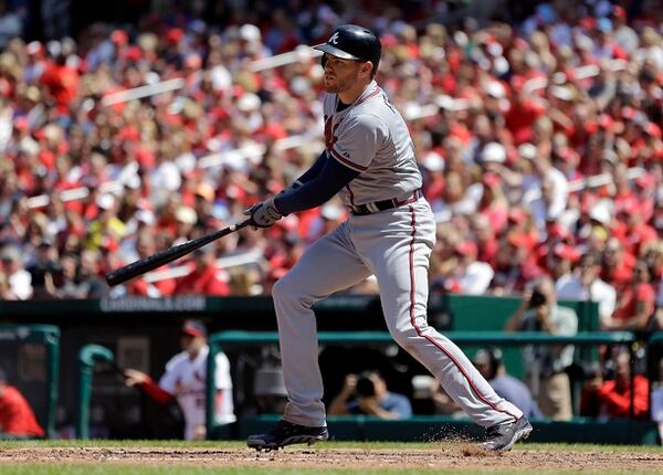 Atlanta Braves' Freddie Freeman watches his two-run single during the sixth inning of a baseball game against the St. Louis Cardinals Sunday, May 18, 2014, in St. Louis. (AP Photo/Jeff Roberson) Here's one guy you can't fault. (Jeff Roberson/AP)