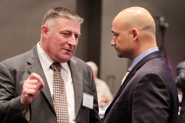 Doraville Police Chief John King (seen in this 2012 photo on left) was named to replace suspended Georgia Insurance Commissioner Jim Beck. Photo: Miguel Martinez/Mundo Hispanico