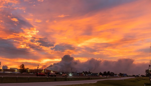 Smoke could still be seen Tuesday in the Rockdale County sky after a chemical plant fire Sunday.