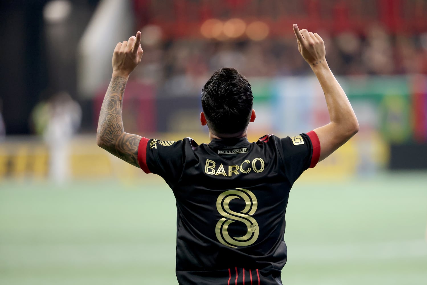 Atlanta United midfielder Ezequiel Barco (8) reacts after scoring a goal off of a free kick during the first half against D.C. United at Mercedes-Benz Stadium Saturday, September 18, 2021 in Atlanta, Ga.. JASON GETZ FOR THE ATLANTA JOURNAL-CONSTITUTION