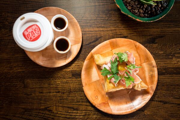 El Super Pan Colada is strong Cuban espresso and cane sugar, pictured with Huevos en Croute pastry. Photo credit- Mia Yakel.