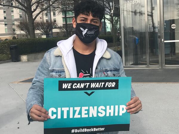 Alberto Feregrino was among those who participated in a rally that CASA, an immigrant advocacy organization, held a  outside Sen. Jon Ossoff's Atlanta office on Friday, December 17, 2021 after the Senate parliamentarian rejected a key immigration provision in Democrats' Build Back Better package. (Lautaro Grinspan)