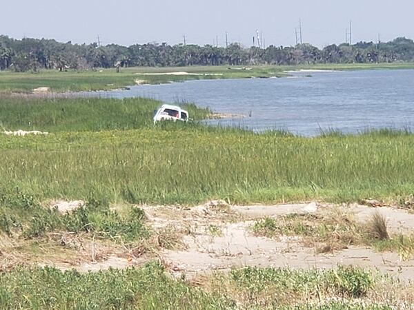 A pickup truck was brought in to remove the sunken ATV, but that became stuck, too.