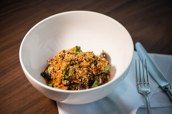 Squid ink conchiglie, braised cuttlefish, bone marrow sugo, and tuna heart bottarga. Photo credit- Mia Yakel.