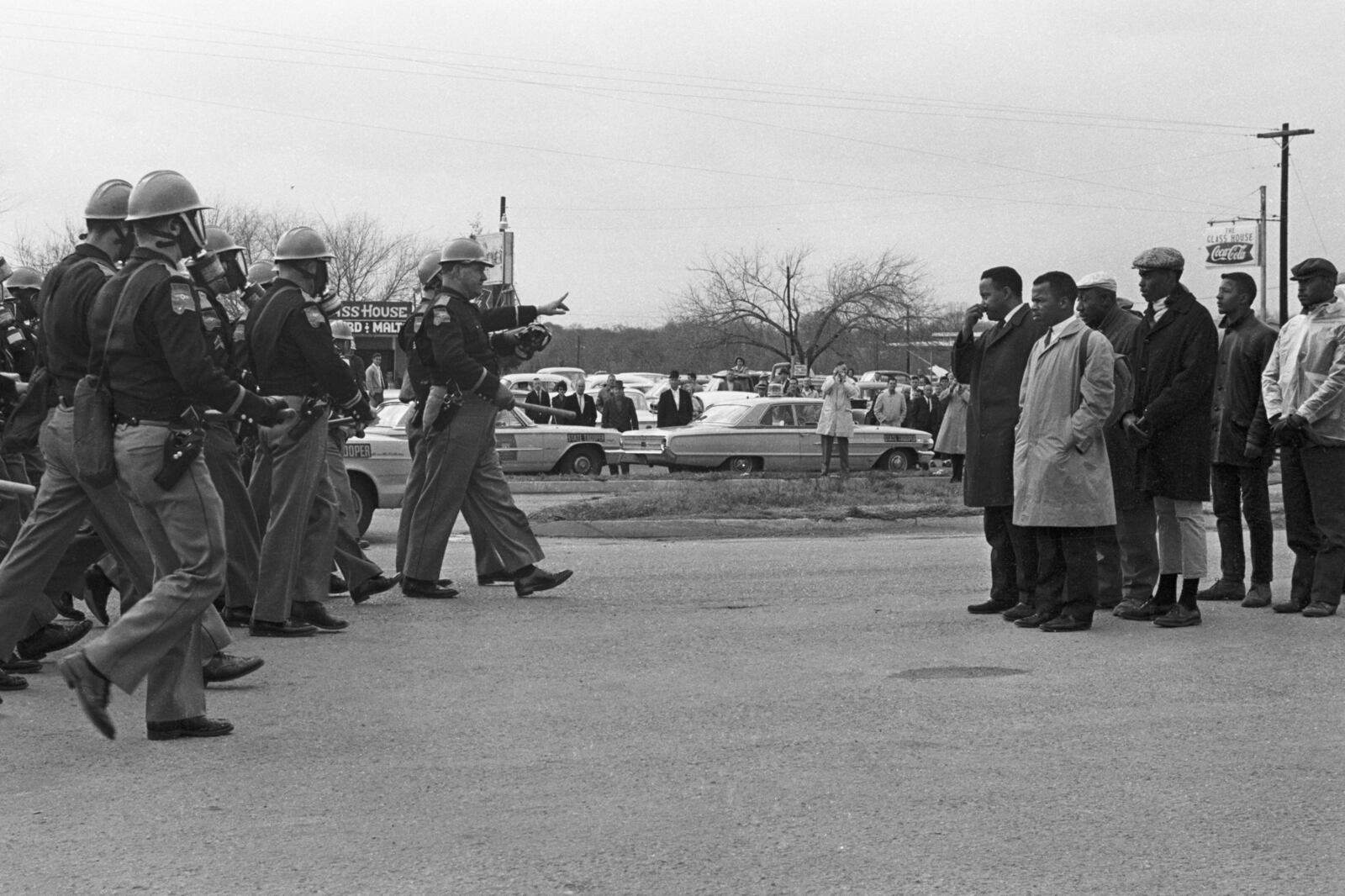 Congressman John Lewis (right side, with tan coat) and Hosea Williams are shown moments before they were attacked by Alabama state troopers in this March 7, 1965 photo by Spider Martin. It’s a day that would be known as “Bloody Sunday.” CONTRIBUTED BY MAGNOLIA PICTURES