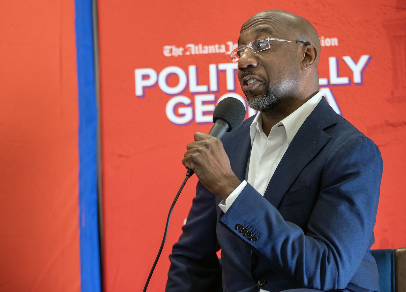 U.S. Sen. Raphael Warnock said Democrats will seize every opportunity to point out the differences between Kamala Harris, a former prosecutor and state attorney general, and Donald Trump, who earlier this year was found guilty on felony charges in New York. “Will America choose the criminal?" Warnock asked during an appearance on "Politically Georgia."  "Or the person who’s spent much of her career prosecuting criminals?”(AJC Photo/Katelyn Myrick)