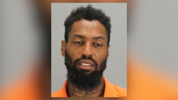 Lloyd Lee Brown, 32, was arrested in connection with the fatal stabbing of 44-year-old Demetrius Johnson.