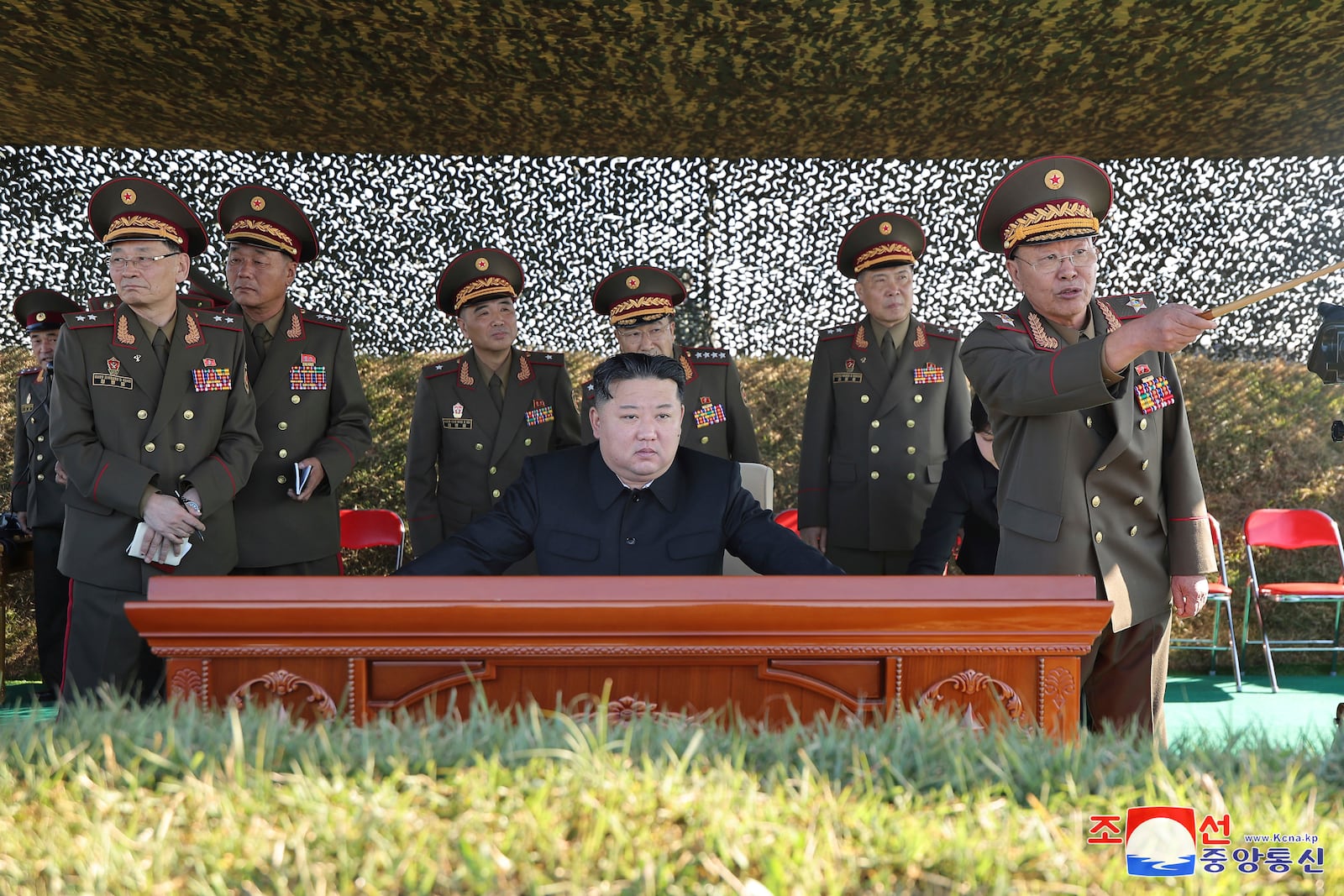 In this undated photo provided on Saturday, Oct. 6, 2024 by the North Korean government, North Korean leader Kim Jong Un, center, watches an artillery exercise at an undisclosed place in North Korea. Independent journalists were not given access to cover the event depicted in this image distributed by the North Korean government. The content of this image is as provided and cannot be independently verified. Korean language watermark on image as provided by source reads: "KCNA" which is the abbreviation for Korean Central News Agency. (Korean Central News Agency/Korea News Service via AP)