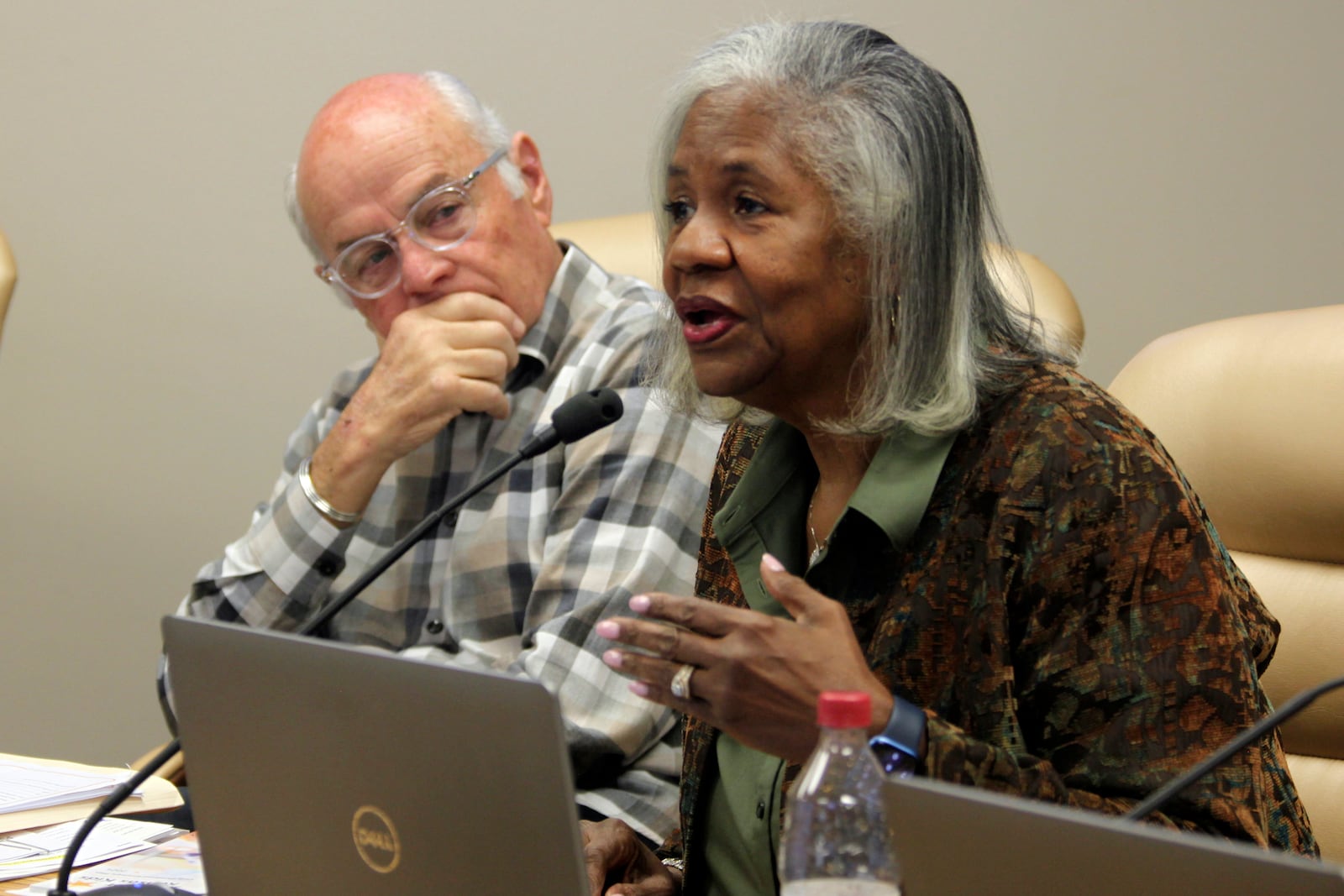 Kansas State School Board member Betty Arnold, right, D-Wichita, makes a point during the board's monthly meeting as fellow board member Danny Zeck, left, R-Leavenworth, watches, Wednesday, Oct. 9, 2024, in Topeka, Kan. (AP Photo/John Hanna)