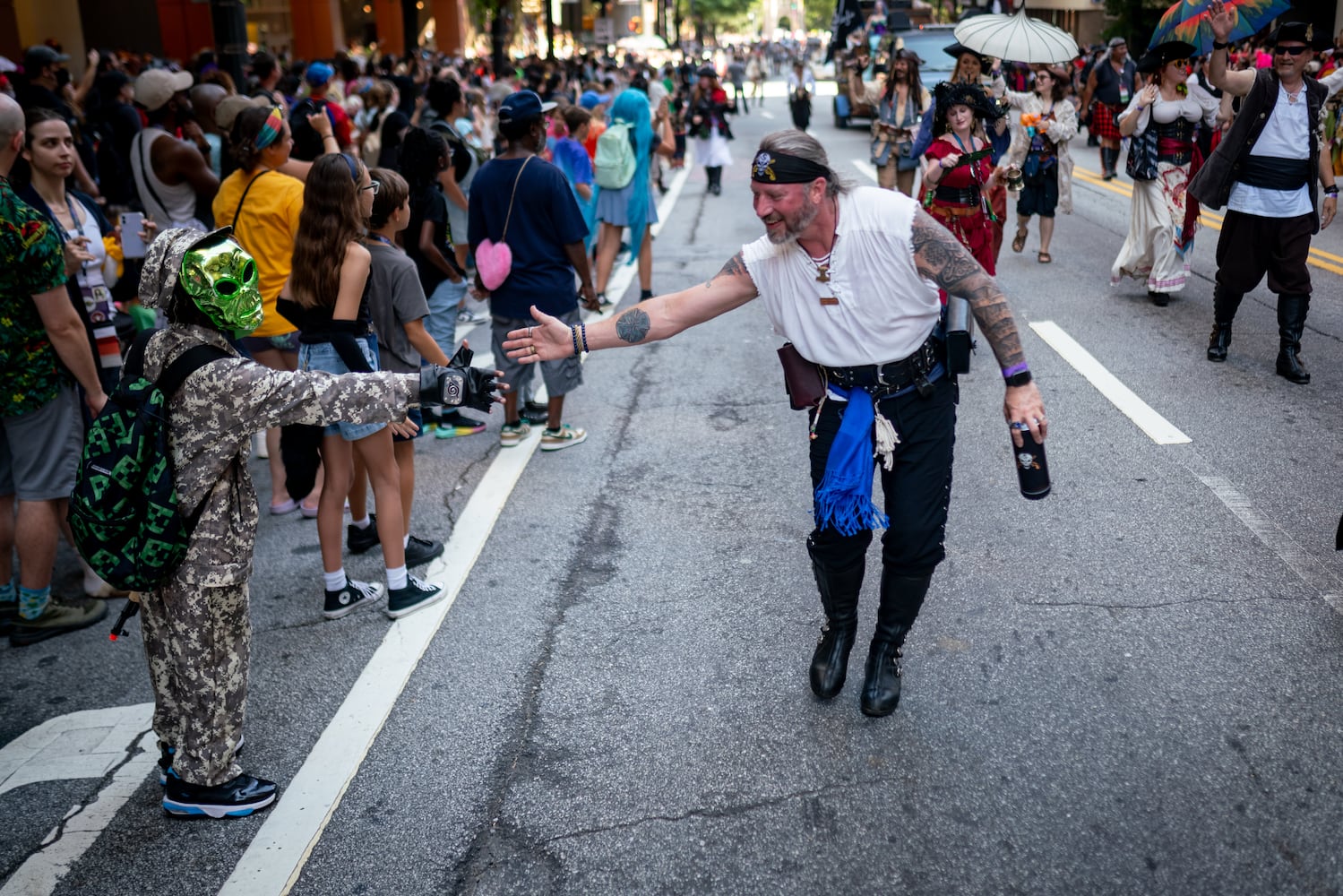 Thousands lined up along Peachtree Street Saturday morning for the annual Dragon Con parade.