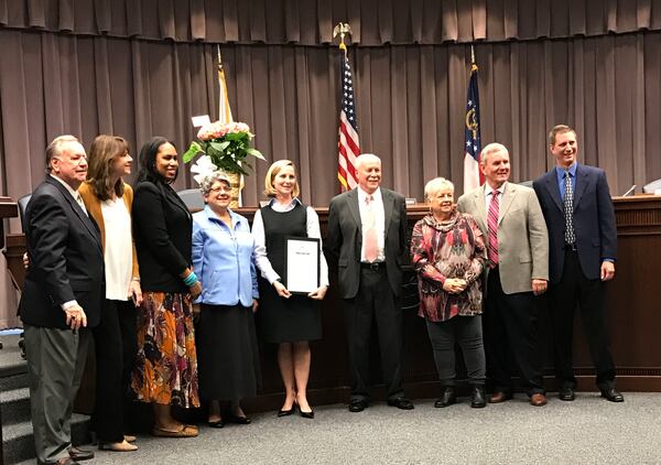 Christi Trombetti was presented with a placard of appreciation at her final planning commission meeting.