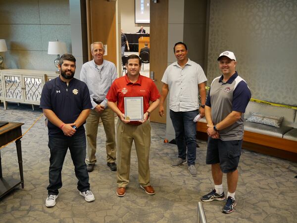 The Cherokee Board of Commissioners proclaimed Oct. 20, 2020 Youth Sports
Champions Day and honored four teams that claimed state titles during their seasons. Pictured, from
left are: Miles Lathem, 6U Canton Stingers Coach; Bill Firnbach, athletic coordinator for Cherokee
Recreation and Parks; Shawn Schumacher, athletic division director for Cherokee Recreation and Parks;
Mark Smith, CHILL Woodstock Middle School Coach; and Matt Hackett, CHILL Woodstock High School
Coach.