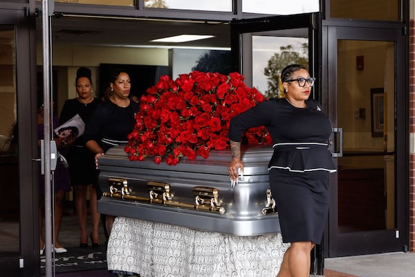 Pallbearers carry the casket of R&B singer Angie Stone to the hearst following the funeral service at Word of Faith Cathedral in Austell on Friday, March 14, 2025. (Natrice Miller/ AJC)