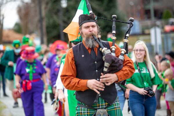 David Gregory leads the St. Patrick's Day parade around Lilburn City Park. (Photo: Steve Schaefer for The Atlanta Journal-Constitution)