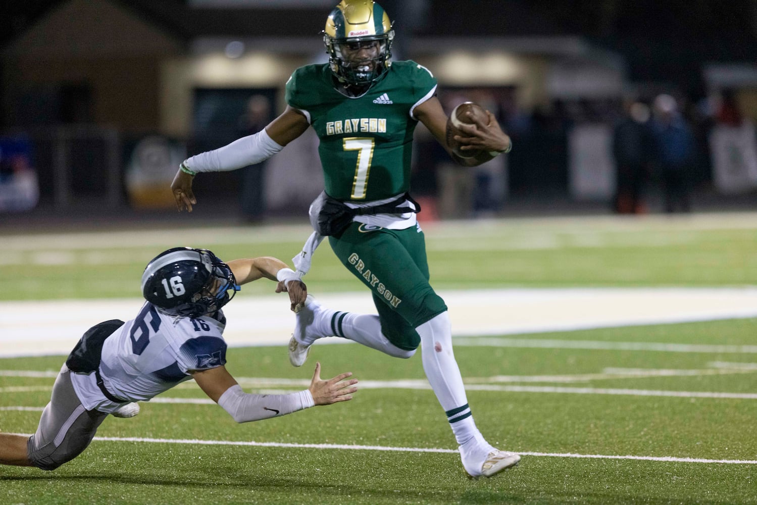 Grayson quarterback Jeff Davis (7) runs the ball during a GHSA High School Football game between the Grayson Rams and the North Paulding Wolfpack at Grayson High School in Loganville, GA., on Friday, November 17, 2023. (Photo/Jenn Finch)