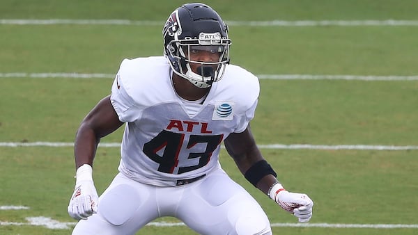 Falcons rookie linebacker Mykal Walker runs a coverage drill during training camp.    Curtis Compton / ccompton@ajc.com