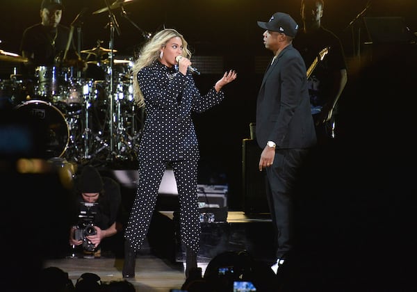 CLEVELAND, OH - NOVEMBER 04:  (L-R) Beyonce and and Jay Z perform on stage during a Get Out The Vote concert in support of Hillary Clinton at Wolstein Center on November 4, 2016 in Cleveland, Ohio. With less than a week to go until election day, Hillary Clinton is campaigning in Pennsylvania, Ohio and Michigan.  (Photo by Duane Prokop/Getty Images)