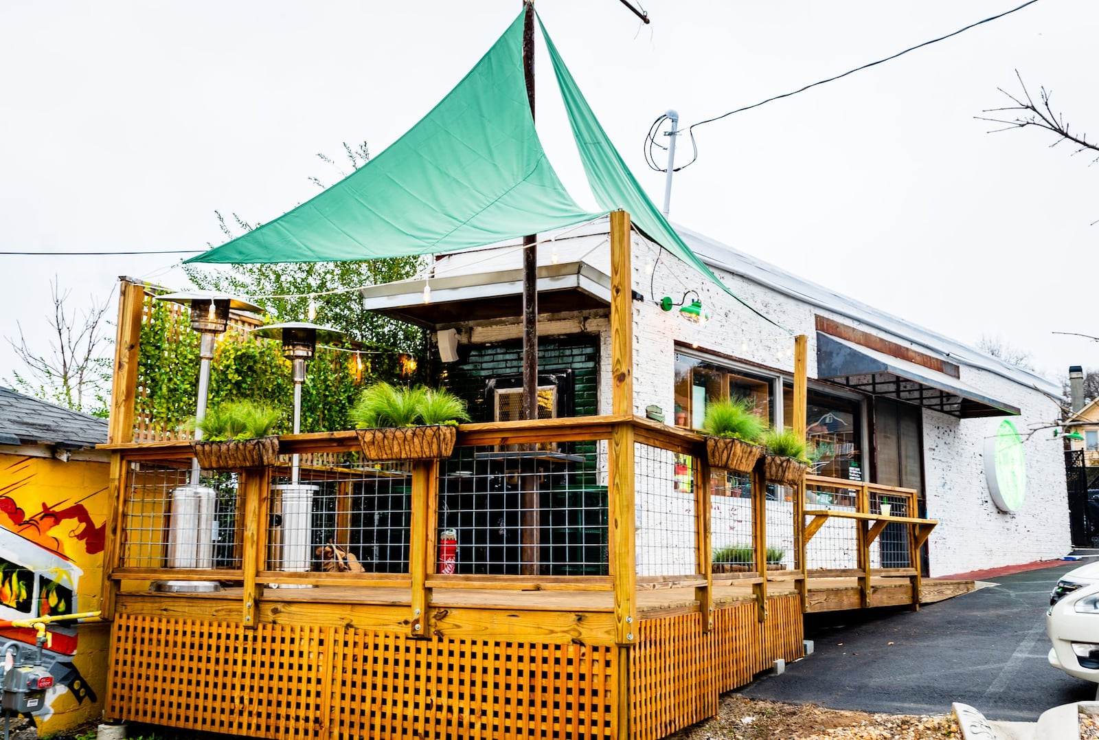 Once you get your food at Supremo Taco, you can eat it on the adjacent, umbrella-shaded deck. CONTRIBUTED BY HENRI HOLLIS