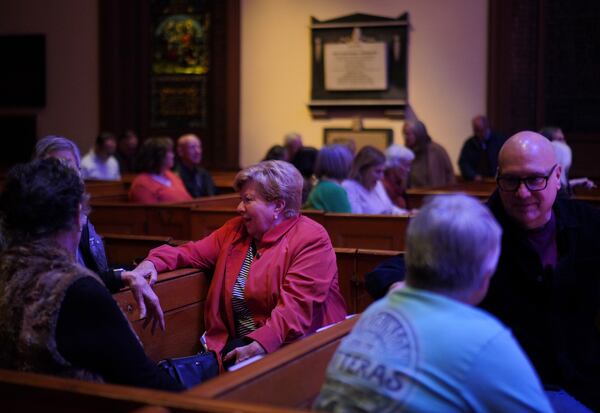 People gather at St. James Episcopal Church in Lancaster, Pa., for a "Contemplative Citizenship" service, on Tuesday, Oct. 15, 2024. (AP Photo/Jessie Wardarski)