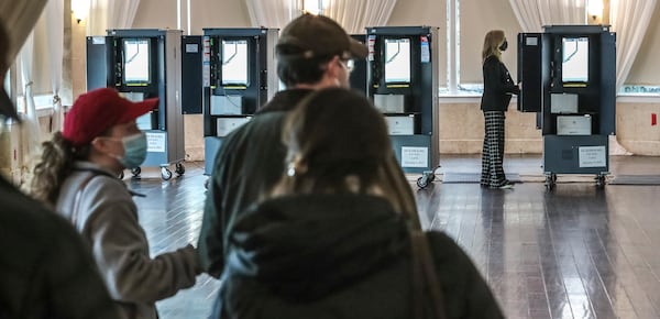 January 5, 2021 Atlanta: Voters lined up to cast ballots on Tuesday, Jan. 5, 2021 at the Park Tavern located at 500 10th St NE in Atlanta. Georgia’s long moment in the national spotlight culminated Tuesday, Jan. 5, 2021, when state voters cast their votes to determine which party would control the U.S. Senate. Georgia voters also voted to elect a member of the state Public Service Commission, which regulates energy and utility rates and issues. The two most expensive Senate races in history saw more than $833 million been spent by the four campaigns and outside groups supporting them, blanketing the airwaves and stuffing mailboxes across the state. Much of that money has come from organizations with no direct connection to Georgia. (John Spink / John.Spink@ajc.com)

