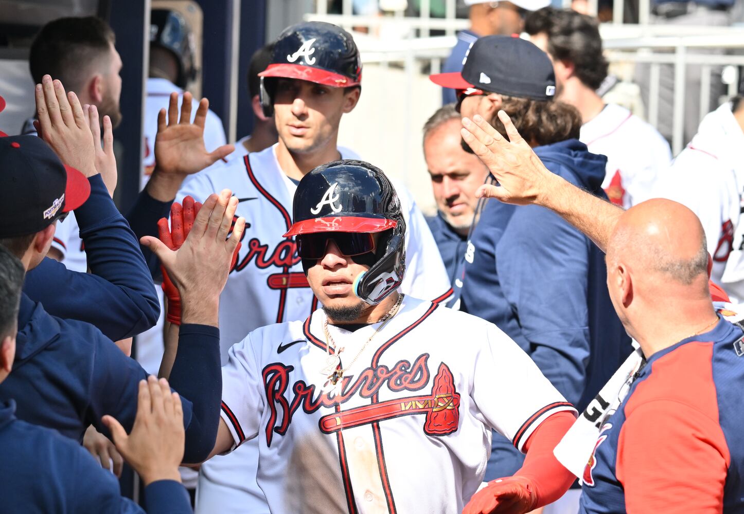 Atlanta Braves' William Contreras and Matt Olson score on a double by Travis d'Arnaud during the fifth inning of game one of the baseball playoff series between the Braves and the Phillies at Truist Park in Atlanta on Tuesday, October 11, 2022. (Hyosub Shin / Hyosub.Shin@ajc.com)