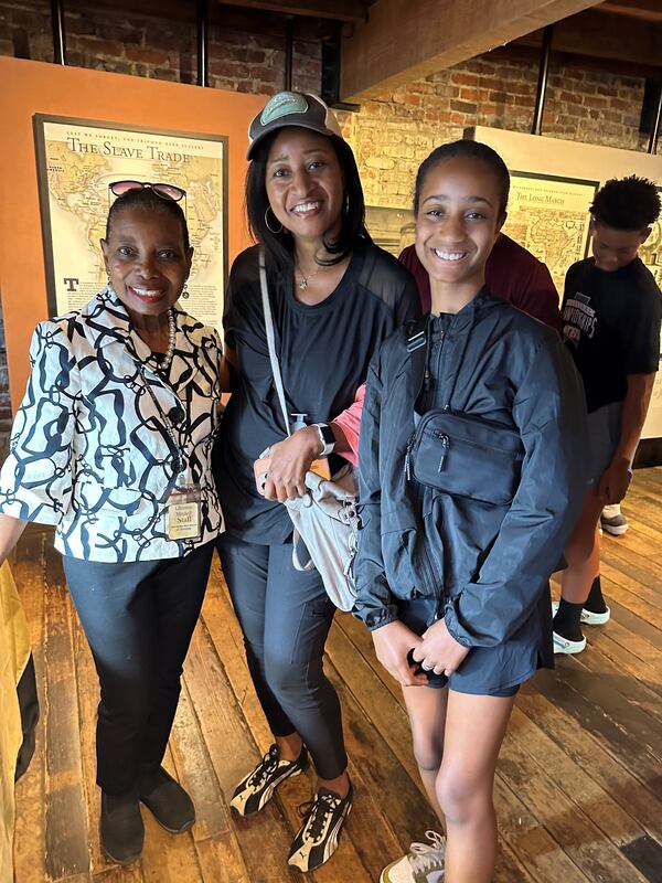 While traveling to Charleston, Nedra and Layla Rhone met Christine King Mitchell, a native of Augusta, who is a docent for the Old Slave Mart Museum.