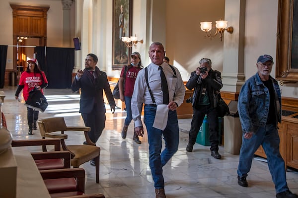 On Jan. 6, 2021, Chester Doles, leader of American Patriots USA, roamed the Georgia State Capitol building looking for Secretary of State Brad Raffensperger. Doles made remarks at a ‘Stop the Steal’ rally outside of the building before attempting to speak with Raffensperger. (Alyssa Pointer / AJC file photo)