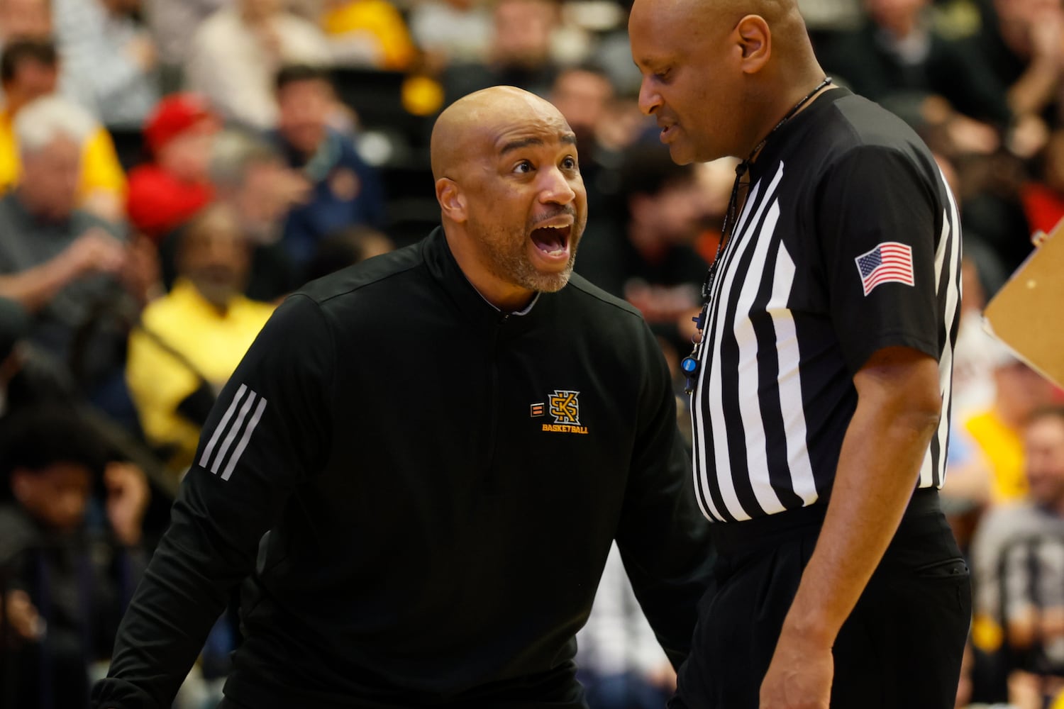 Kennesaw State Owls head coach Amir Abdur-Rahim argues a call with a referee.
 Miguel Martinez / miguel.martinezjimenez@ajc.com