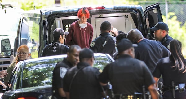 A multi jurisdiction law enforcement operation took alleged trespassers into custody on May 17, 2022, at the site of the Old Atlanta Prison Farm at 1420 Key Road where the new Atlanta law enforcement training academy facility is slated to be built. (John Spink / John.Spink@ajc.com)


