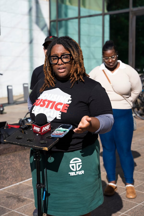 Monica Johnson, Director of Organizing, Housing Justice League, speaks at a press conference outside of the Atlanta City Hall on Monday, Nov. 18, 2024 (Olivia Bowdoin for the AJC). 