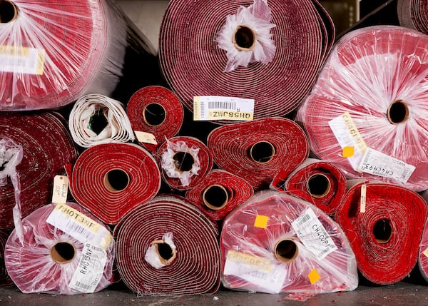 
                        Rolls of the 2025 Oscars red carpet, in an exclusive shade known as Academy Red, arrived at a warehouse in La Mirada, Calif., on Feb. 21, 2025. Steve Olive, who has worked in the event carpet business for more than three decades, is the man the Academy trusts to get its iconic rug just right. (Jennelle Fong/The New York Times)
                      