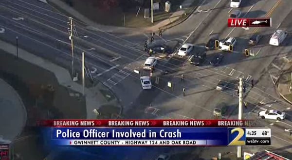 The Snellville police officer was hit  while on a patrol motorcycle, officials said.