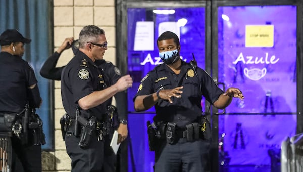 May 17, 2021 Atlanta: Atlanta police investigate the shooting scene at the Azule Restaurant and Lounge located at 2625 Piedmont Road NE in the Lindbergh area of Buckhead where a 43-year-old man was found dead in a bathroom. His name was not released. The shooting happened at 4;20 a.m. Investigators with Atlanta police and the Fulton County District Attorney’s Office collected evidence and spoke with witnesses at the Piedmont Road nightclub for much of the morning. “Currently, we have two persons of interest,” police Lt. Daniel Genson told The Atlanta Journal-Constitution from the scene. “We’re not ready to put that information out as far as more details on that, but we do have strong leads right now that we are following up on.” Before the sun came up Monday morning, four people were killed in shootings across the city of Atlanta. The killings cap off another particularly violent weekend in the city, which saw multiple shootings that left two more dead and more than seven wounded. They bring Atlanta’s total number of homicides to 52, an increase of more than 50% from this time last year. According to Atlanta police, Monday’s shootings occurred within a span of four hours and sent homicide detectives to crime scenes in Buckhead, Vine City and southwest Atlanta’s Sylvan Hills neighborhood. (John Spink / John.Spink@ajc.com)


