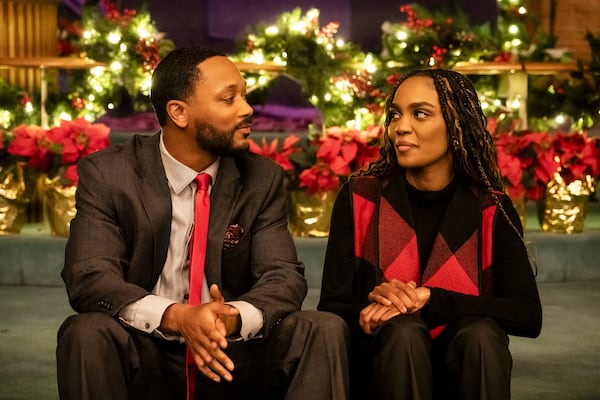 This image released by BET+ shows Romeo Miller, left, and China Anne McClain in a scene from “Brewster's Millions: Christmas." (BET+ via AP)