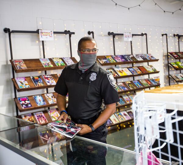 Detective Robert Byars has shopped at Infinite Realities since the store opened. Jenni Girtman for The AJC