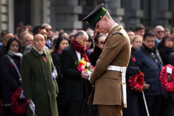 A soldier from Number 9 Company Irish Guards stands at The Cenotaph during the annual Service of Remembrance on Armistice Day in London, Monday, Nov. 11, 2024. (AP Photo/Kirsty Wigglesworth)