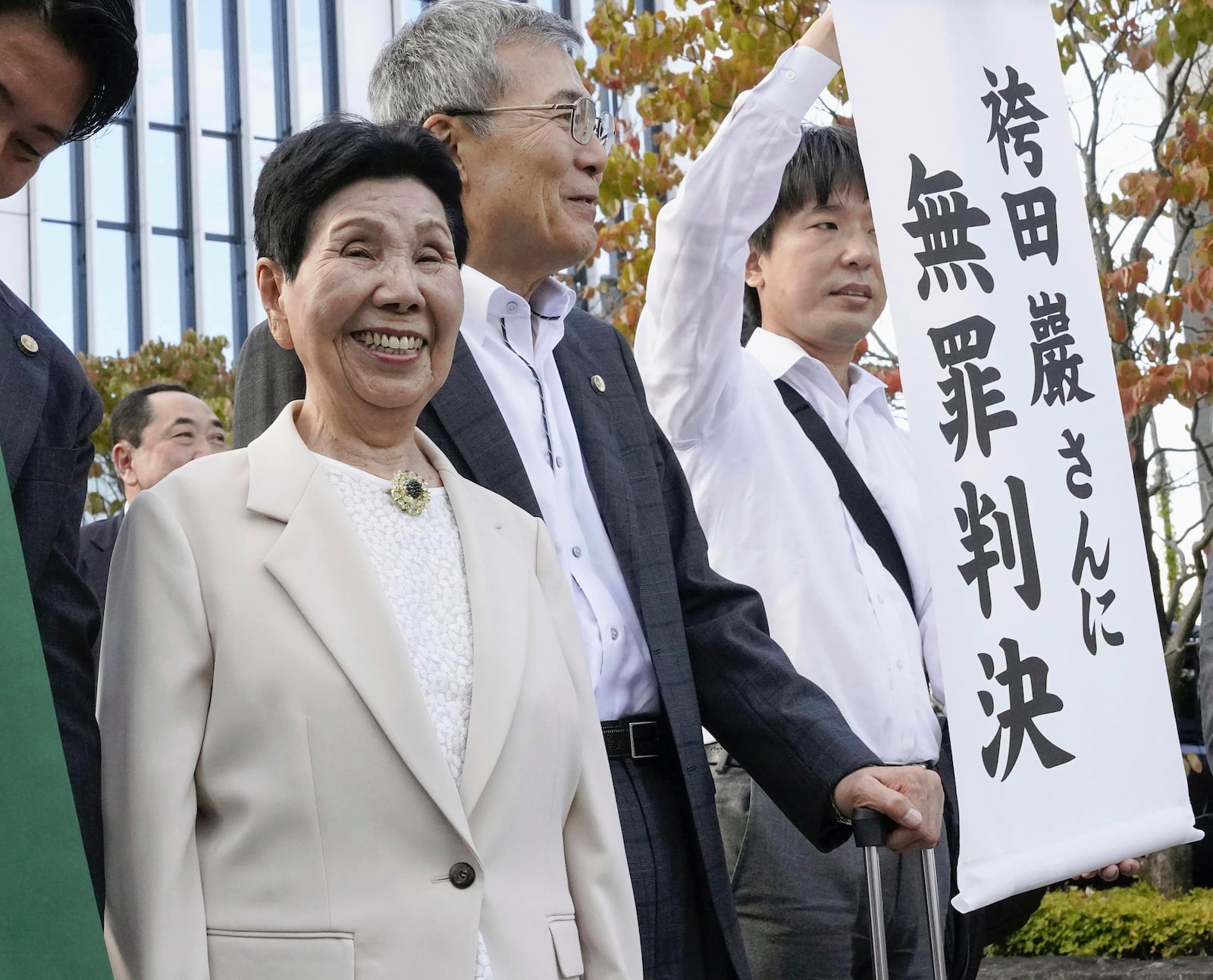 Hideko Hakamada, left, sister of former boxer Iwao Hakamada who has been on death row for the 1966 murder case, reacts after the Shizuoka District Court found her brother not guilty following a retrial at the court in Shizuoka, central Japan, on Sept. 26, 2024. Japanese prosecutors said on Oct. 8, 2024 they will not appeal the Sept. 26 ruling of the Shizuoka District Court that acquitted the world’s longest-serving death-row inmate in a retrial. (Kyodo News via AP)