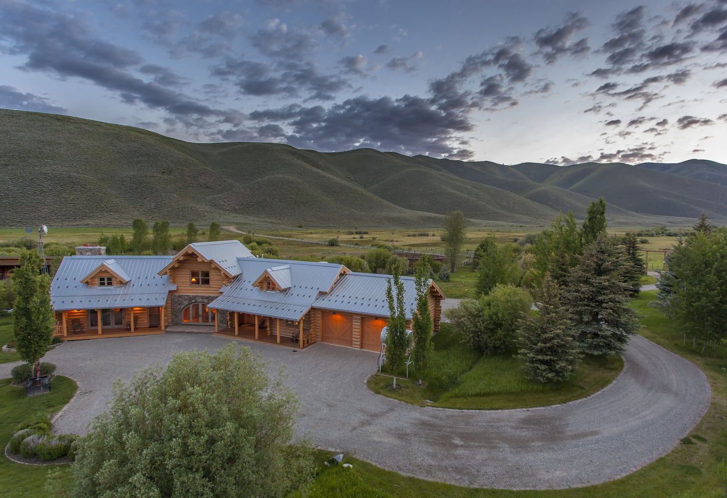 500-acre property has log cabins, mountain views