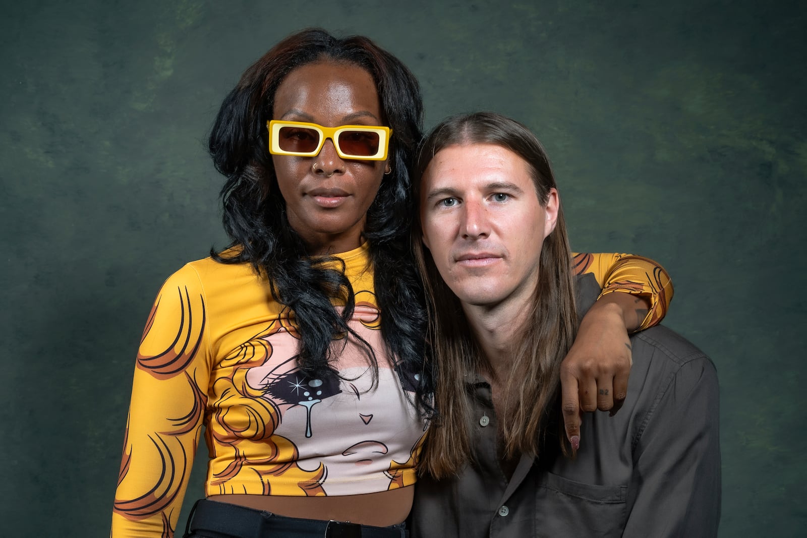 Dawn Richard, left, and Spencer Zahn pose for a portrait to promote the album "Quiet in a World Full of Noise" in Los Angeles on Thursday, Oct. 10, 2024. (AP Photo/Damian Dovarganes)