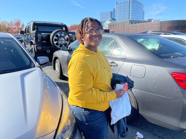 Sharese McGee, 40, of Lithonia, traveled to Perimeter Mall for sneakers on Friday.