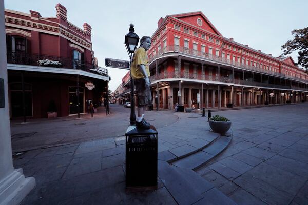 Street performer Eddie Webb looks around the nearly deserted French Quarter.