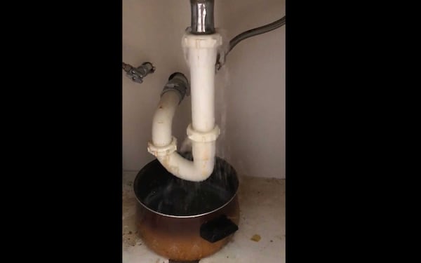 Nandi Jackson,  a resident of Kingsley Village, took photos and videos of her sink leaking. She said it happens every time she or her neighbors flush the toilet. (Courtesy of Nandi Jackson)