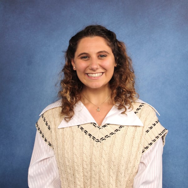 Emily Yehezkel speaks to classrooms, synagogues and universities about her late grandfather, Martin Brown, who survived Auschwitz. Yehezkel grew up in New York, where she was involved with an organization called 3GNY, an educational nonprofit created by people who publicly tell their grandparents’ stories from the Holocaust. Yehezkel has started a local chapter called 3GATL.
“I try to pass on this message that we all have a voice - we all have the power to do good in this world and the responsibility to do that,” she said. Courtesy of Emily Yehezkel