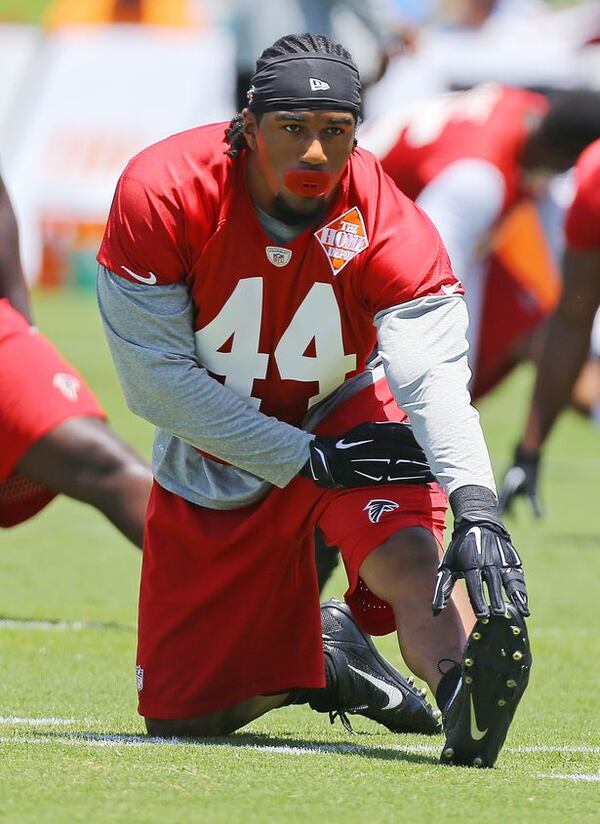 FILE PHOTO: Falcons Vic Beasley Jr. stretches out while the team opens a 3 day mini-camp open to the public on Tuesday, June 16, 2015, in Flowery Branch. Beasley will be counted on to help improve the team's pass rush. Curtis Compton / ccompton@ajc.com