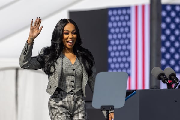 Singer Monica speaks at Democratic presidential candidate Kamala Harris’ campaign rally at the Atlanta Civic Center parking lot in Atlanta on Saturday, November 2, 2024. (Arvin Temkar / AJC)