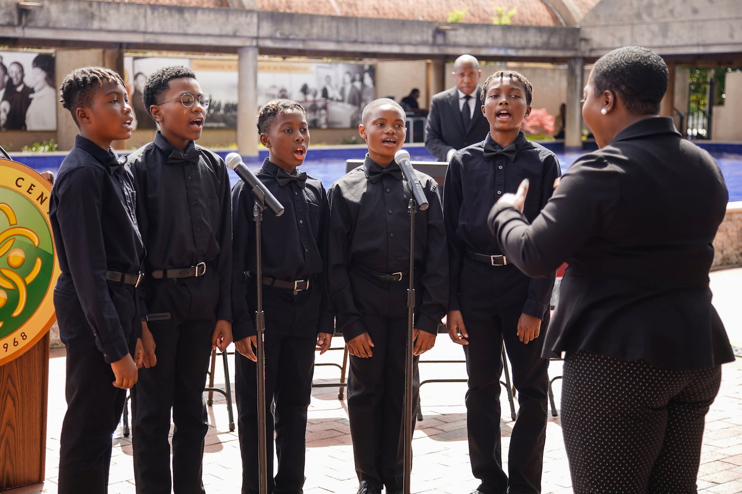 Members of the West Side Heritage Ensemble, made up of elementary students from two different schools, sing at a wreath laying ceremony at The King Center on the 54th anniversary of the assassination of Dr. Martin Luther King Jr., on Monday, April 4, 2022, in Atlanta. (Elijah Nouvelage/Special to the Atlanta Journal-Constitution)